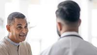 Patient talking with a doctor.